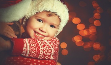 Happy Child in Christmas Sweater